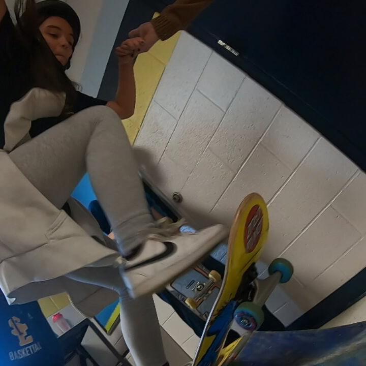 Skateboarding inside East Middle 1